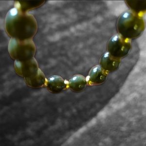 HP 😊 Wisconsin Monarch's Dark Jade Green/Gold Bracelet